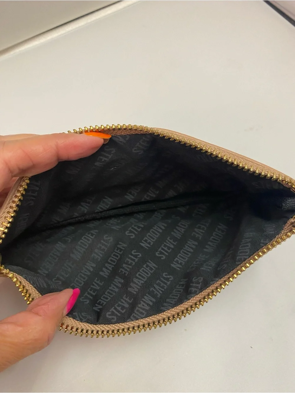 Steve Madden Beige Zip-Top Cosmetic Wristlet with Gold Hardware